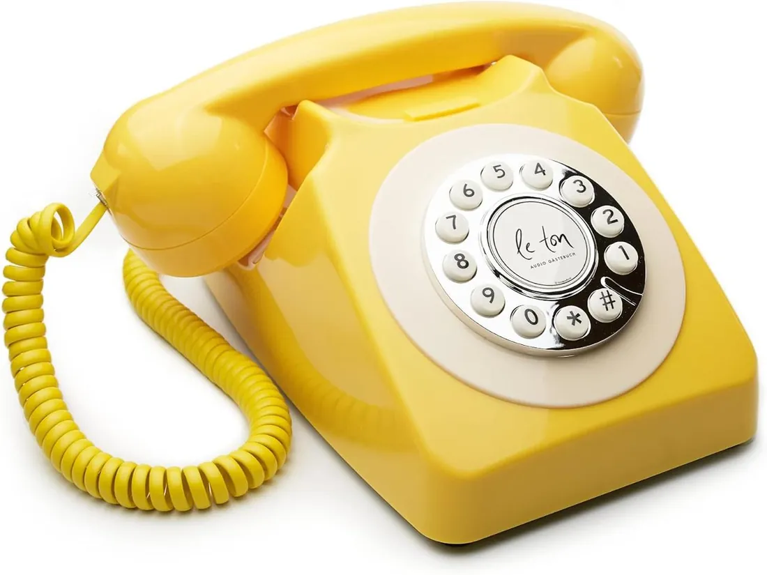 The Riviera: een gele vintage telefoon uit de jaren zestig met chromen knoppen